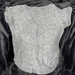 Gray scooping with button nursing top.